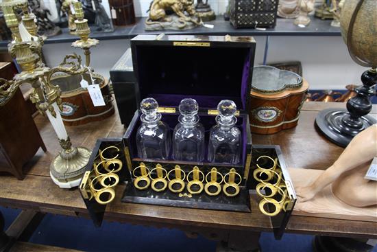 A Victorian brass bound and coromandel liqueur set, 15in.
